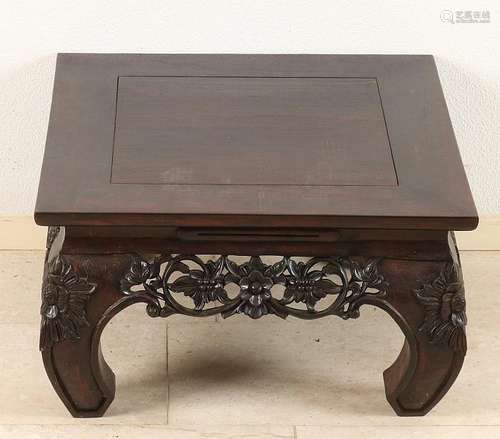 Oriental teak coffee table with floral carvings. Second