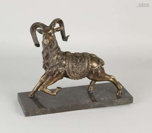 Chinese bronze ibex on black marble base. Size: 23 x 29