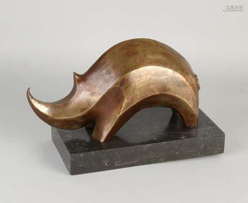 Art Deco style bronze rhinoceros on black marble base.