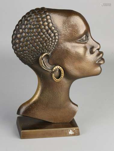 Bronze bust of an African woman. 20th century.