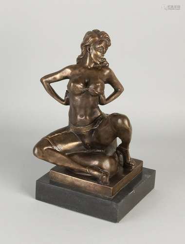 Erotic bronze figure with black marble base. Erotic