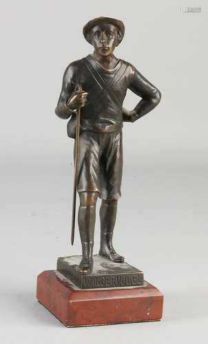 Antique bronze figure on marble base. Titled: