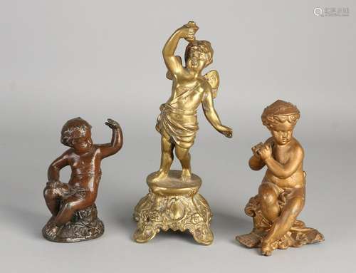 Three antique metal figures. Among other things: one