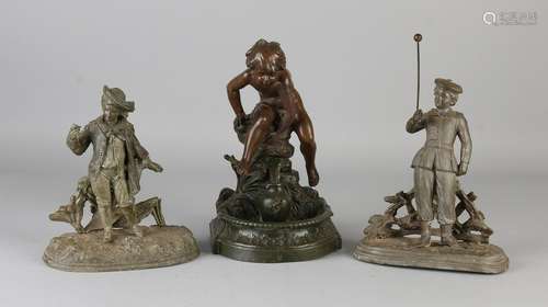 Three antique metal composition figures. Approximately