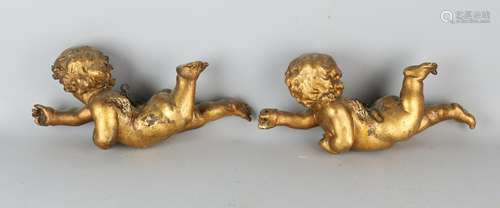 Two 18th - 19th century wooden gilded putti with short