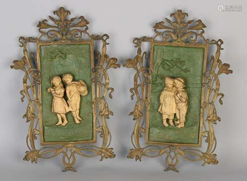 Two antique German Jugendstil bronze wall plaques with