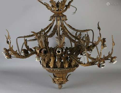 Large antique bronze Rococo-style chandelier with