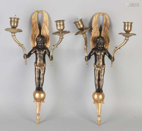 Two Empire style bronze candle candlesticks with