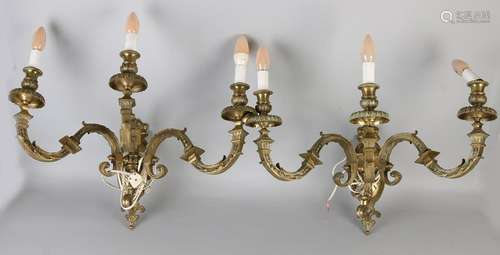 Two large gilt bronze three-arm wall lamps in Louis XVI