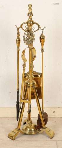 Five-piece Nouveau brass fireplace set. Approximately