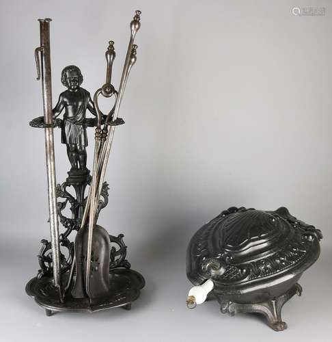 Antique cast iron fireplace set with coal-scuttle.