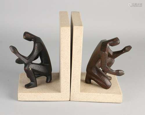 Two 70s bookends of stone and bronze figures. Size: