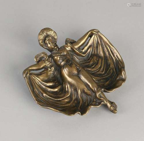 Art Nouveau brass ashtray. Woman with skirt. 20th