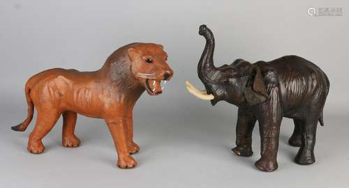 Two leather animals with glass eyes. + Elephant lion.