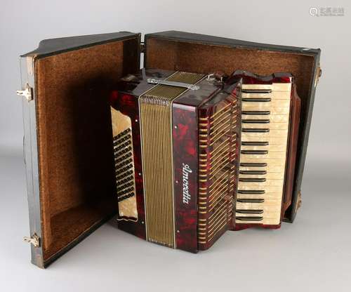 Old accordion case. Branded Amoretta. Circa 1930.