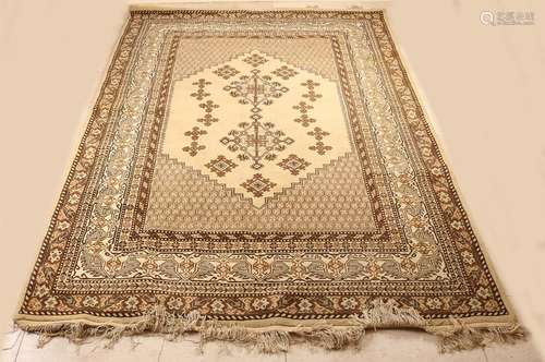 Old Persian rug. Floral, cream-brown. 20th century.