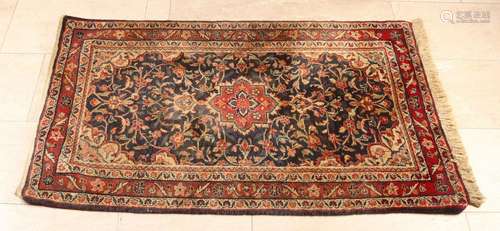 Old Persian rug with floral decor. Reddish color. Size: