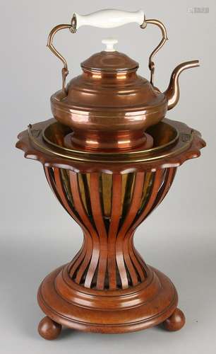 19th Century mahogany tea warmer with copper boiler.