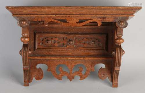 German Gründerzeit oak wall clock console. Circa 1880.