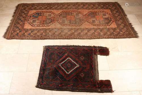 Two Persian rugs. One kameelzak. One kilim rug in sand