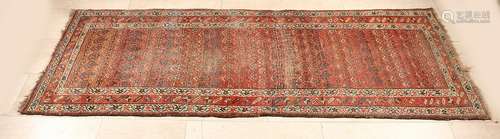 Ancient Persian carpet in the color brown / black /