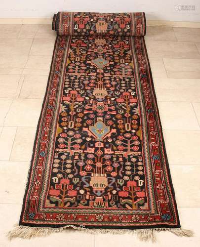 Long Persian carpet with floral decor. Size: 77 x 410