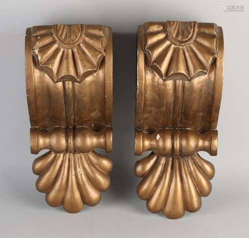 Two 19th century bronze timber inserted wall brackets.