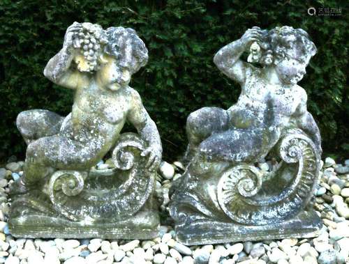 Two large concrete statues cast in Rococo style. With