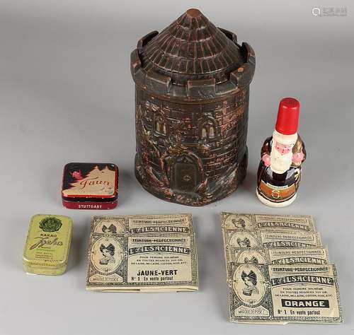 Antique tobacco jar and advertising objects.