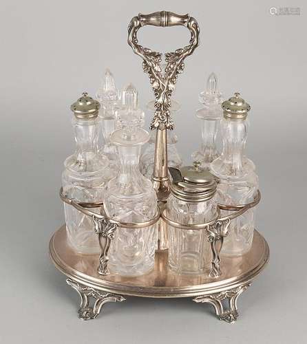 Antique plated eight-piece condiment set with crystal