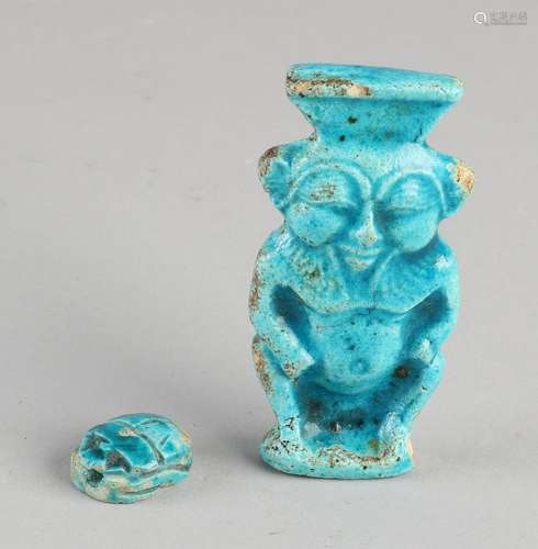 Two ancient Egyptian blue glazed ceramic figures. One