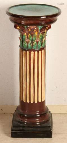 Majolica pedestal in the form of a Corinthian column.