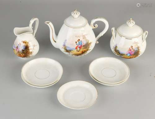 Antique tea set with hand-painted figures show in