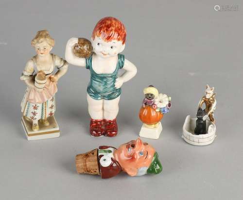 Five parts antique German porcelain. Comprising: Woman