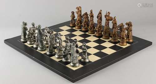 Chess Don Quixote. Plastic-metal-colored characters and