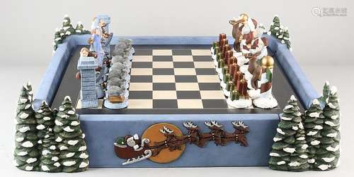 Ceramic Christmas chess with casing and containing a