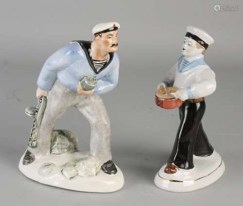 Two old Russian porcelain figures. One times sailor