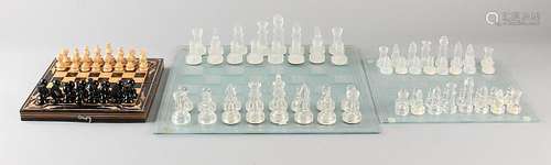 Three chess games. Comprising: Set glass becomes large.