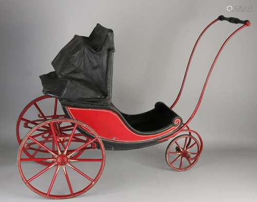 Rare 19th century toy doll carriage with leather booth,