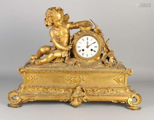 Large gilt bronze mantle clock with Cupid. Circa 1860.