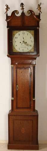 Antique English grandfather clock with oak / mahogany