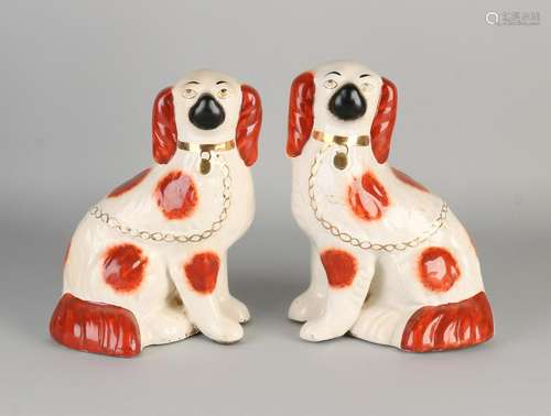 Two antique English Staffordshire ceramic dogs. Circa