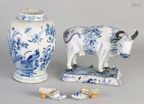 Four parts Delft Fayence. 18th century. Consisting of: