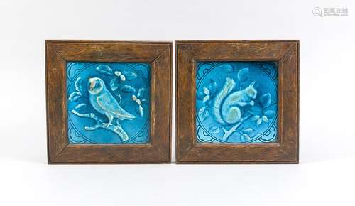 Two antique Majolica stove tiles in oak frame. Squirrel