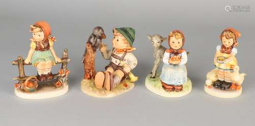 Four Hummel figures of Goebel. Comprising: Girl sitting