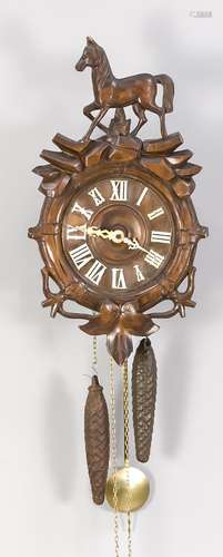 Antique German Black Forest wall clock with carving.