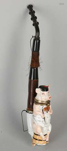 Antique porcelain pipe with pig. Jest pipe. One ear