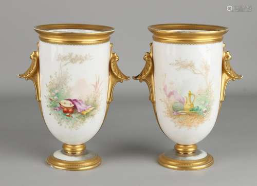 A pair of gilt porcelain 