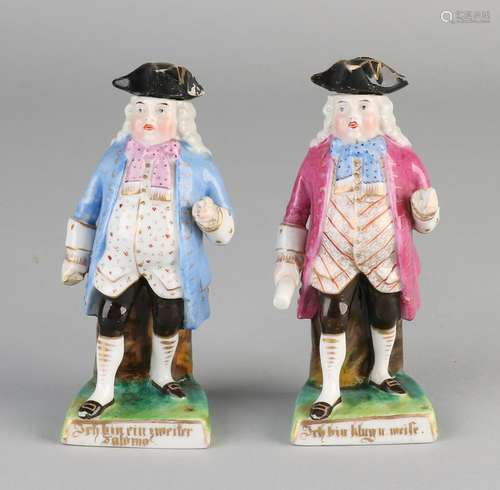 Two antique German porcelain figures with schnapps hat