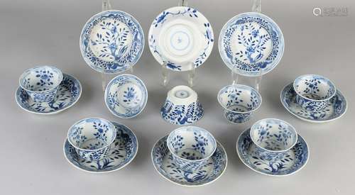 Eight Chinese porcelain Kangxi branded cups and saucers